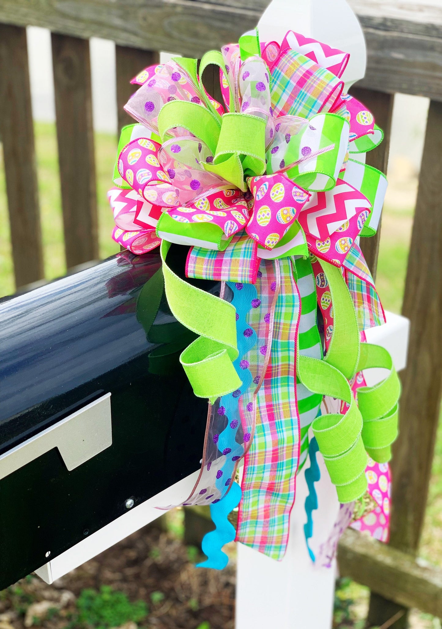 Easter Bow in Bright Pink and Green Featuring Multicolor Easter Egg Ribbon. Perfect for Mailbox, Door, and Wreath.