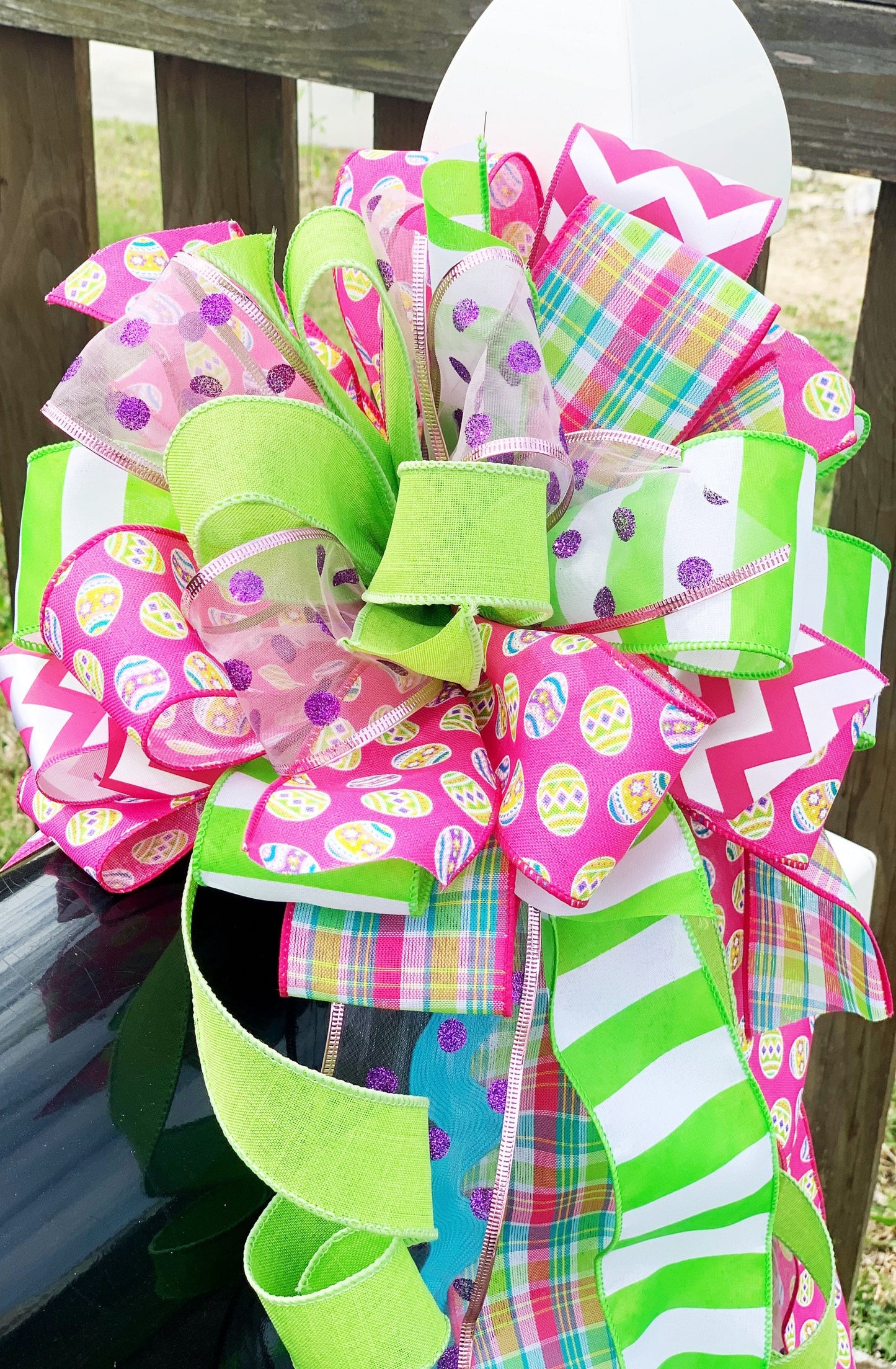 Easter Bow in Bright Pink and Green Featuring Multicolor Easter Egg Ribbon. Perfect for Mailbox, Door, and Wreath.