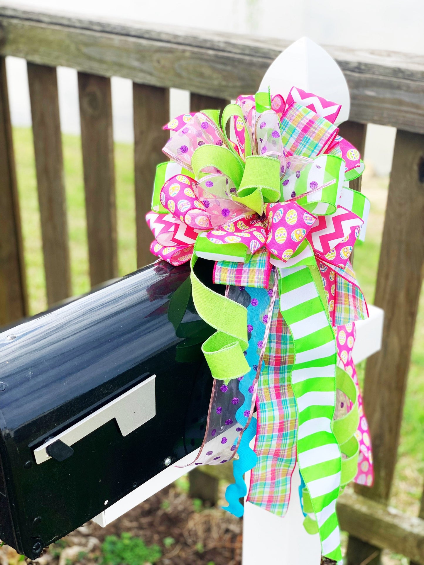 Easter Bow in Bright Pink and Green Featuring Multicolor Easter Egg Ribbon. Perfect for Mailbox, Door, and Wreath.