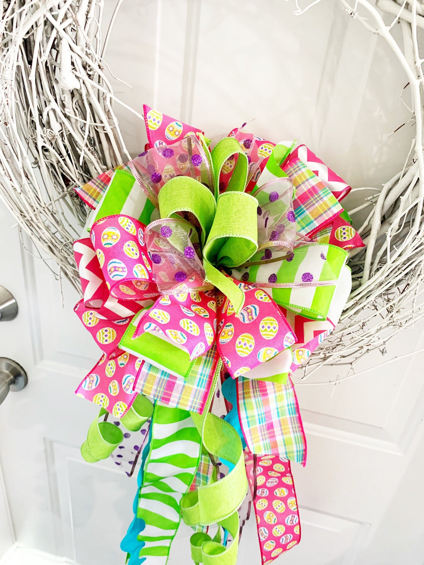 Easter Bow in Bright Pink and Green Featuring Multicolor Easter Egg Ribbon. Perfect for Mailbox, Door, and Wreath.